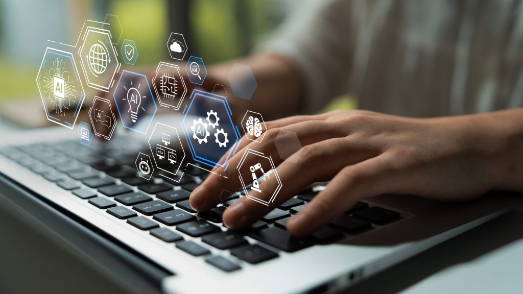 Two hands on a keyboard with digital pictograms